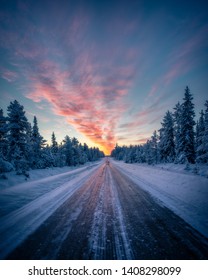 Road Leading Toward Sunset In Winter