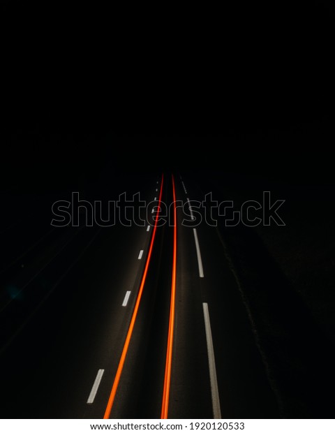 Road lights dark\
road night red lights\
trail