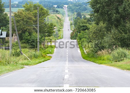 A road like a roller coaster. Biei Hokkaido, Japan