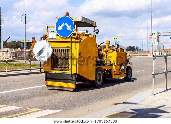 Road line painting yellow\
truck
