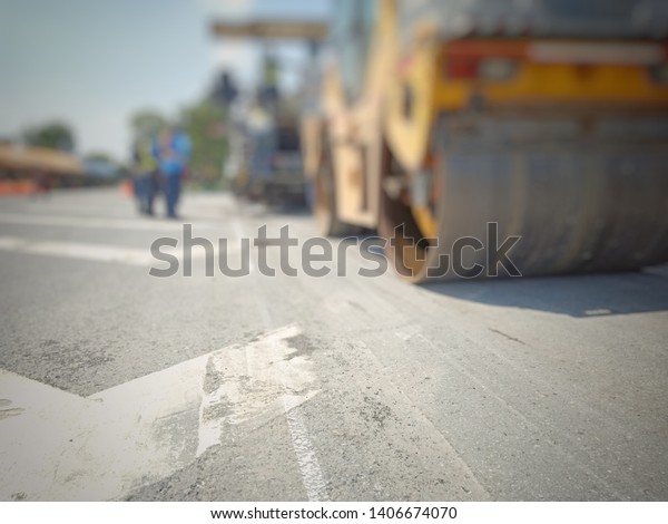 Road maintenance by burning old materials and
improving quality, blurred
images