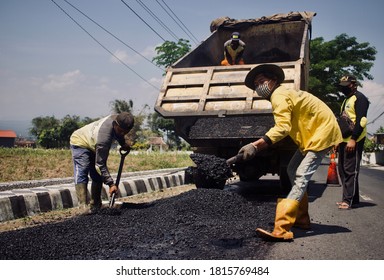 Road Maintenance Worker During Their Mid Hot Summer Day Job In Temanggung, Central Java, Indonesia, Photograph In September 2020