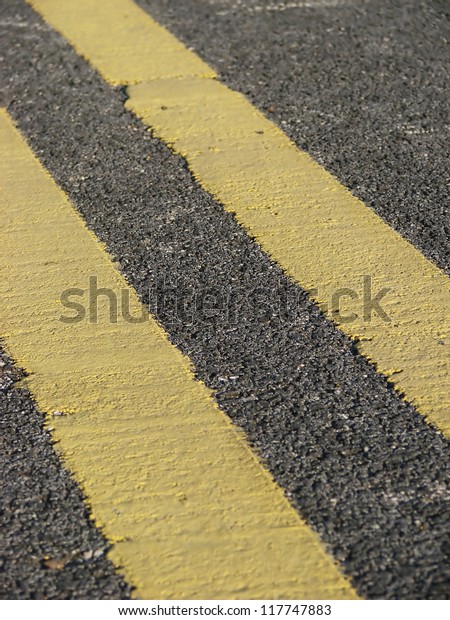 Road marking - double yellow lines on the\
asphalt road (forbidden\
parking)