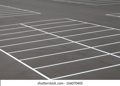 Road marking on the asphalted parking place