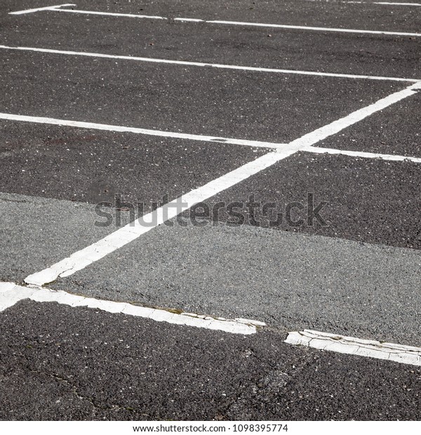 Road marking on the\
asphalted parking lot