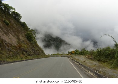 The Road In The Mountains Of Ecuador Clouds On The End Of The Road.