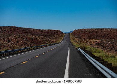 Road In Mountains, Travel Concept And American Roadtrip. Empty Asphalt Highway