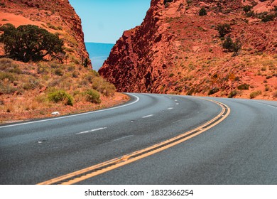 Road In Mountains, Travel Concept And American Roadtrip. Empty Asphalt Highway.