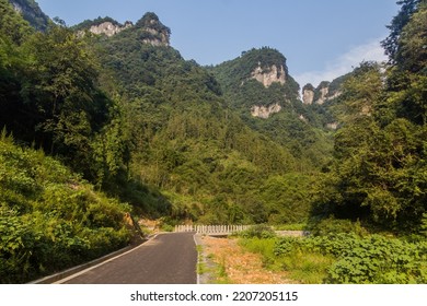 Road near Dehang Miao village, Hunan province, China - Shutterstock ID 2207205115