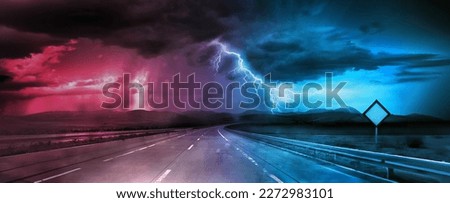 road at night and bad stormy weather with lightning bolt
