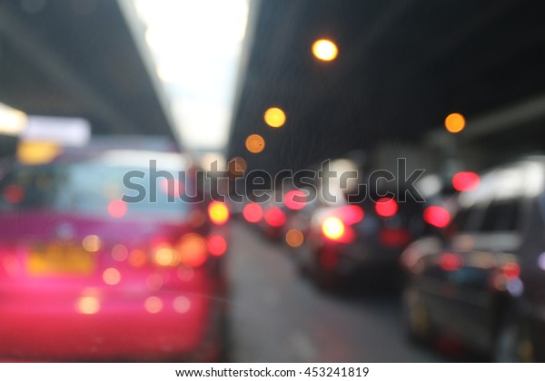 Road\
Night lights car jam of city and abstract bokeh light and burred\
car jam at evening time and night at\
background