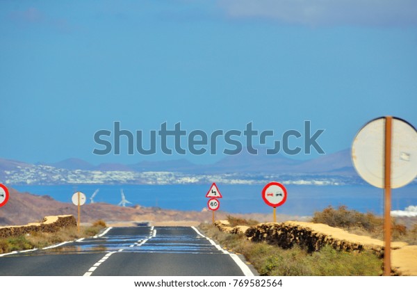road to the\
ocean and island on the hot\
horizon