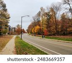 road on the campus of Duke University in Durham, North Carolina during the fall autumn