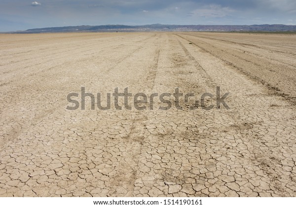 road on a flat desert
surface