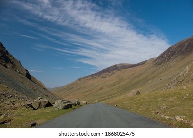 road on the mountains in lake district 