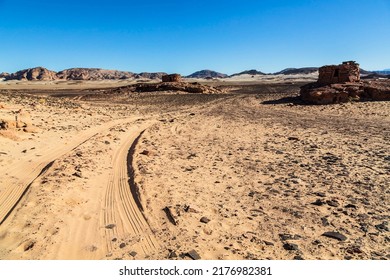Road on the sand leading to Navamis is a complex of stone structures in the Sinai Desert, Egypt