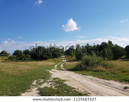 Similar – Zwei Menschen wandern auf einem Berg