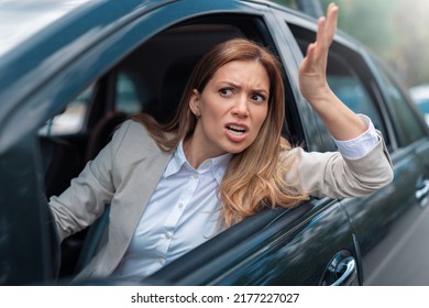 Road rage traffic jam concept. Woman is driving her car very aggressive