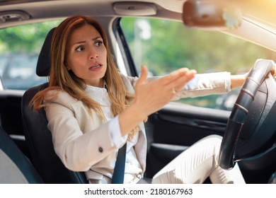 Road Rage Traffic Jam Concept. Woman Is Driving Her Car Very Aggressive