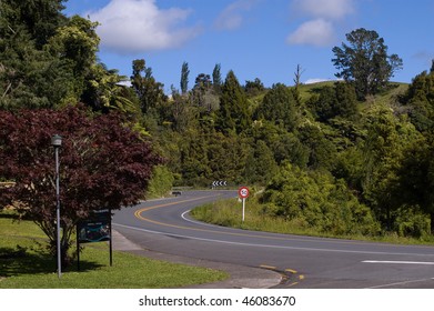 Road With A Red Car Near Waitomo Caves