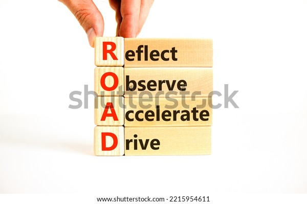 ROAD reflect observe accelerate drive symbol.\
Concept words ROAD reflect observe accelerate drive on blocks on\
white background. Business ROAD reflect observe accelerate drive\
concept. Copy space.