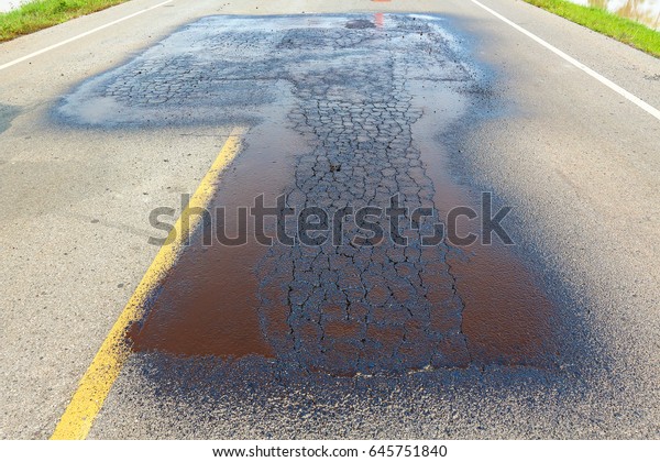 Road repair.\
Construction Worker \
Asphalting.