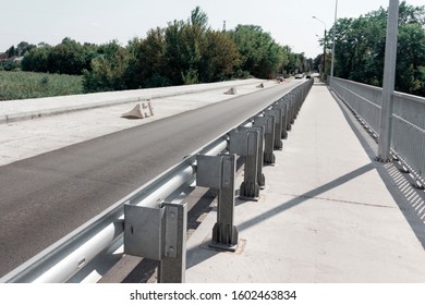 Road Repair On The Bridge. One Way Traffic Blocked