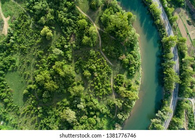 Road, River And Forest Aerial View. Picture Taken With A Drone.