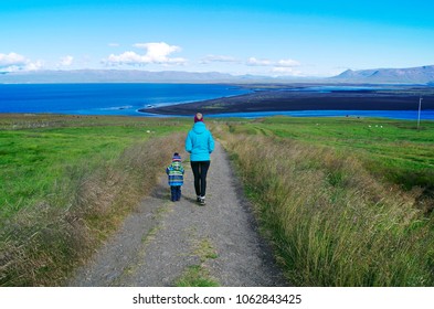 Road To Rock Hvitserkur In Iceland. Mother And Son Going To See Iceland Hvitserkur   Together. Travel With Kids In Iceland. Summer.