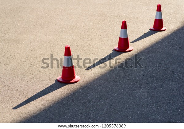 road safety cones on\
asphalt