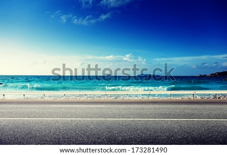 road and sea in sunset time