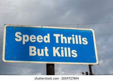 Road side sign of speed thrills but kills - Shutterstock ID 2059727894