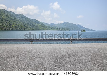 Road side view mountain and sea background