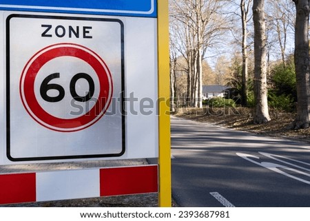 Road sign 60 kilometers per hour zone 