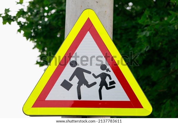 Road sign caution children. Background with copy\
space for text