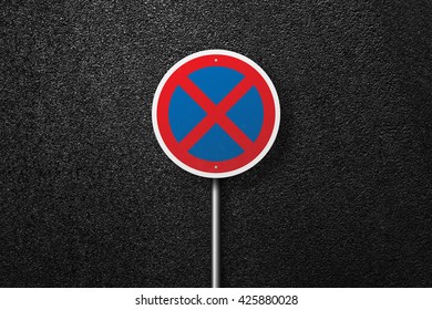 Road sign circular shape on a background of asphalt. The texture of the tarmac, top view. - Shutterstock ID 425880028
