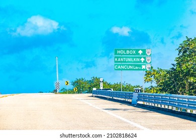 Road Sign At The Highway In The Jungle And Tropical Nature Of Playa Del Carmen Quintana Roo And Lázaro Cárdenas Mexico.