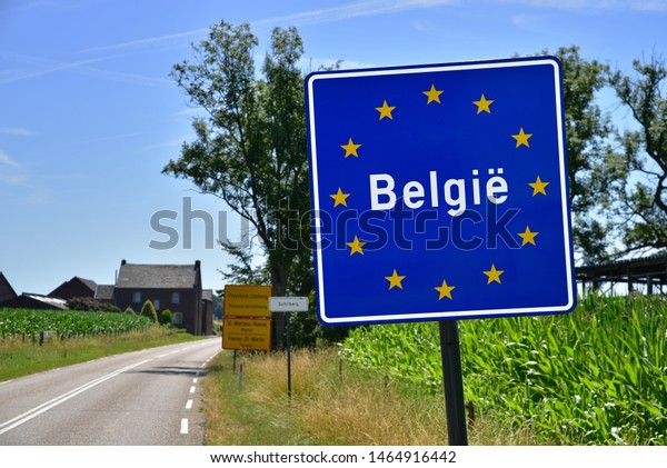 Road\
sign indicating the border of a European Union country: Belgium.\
Written in Dutch at de Netherlands - Belgian\
border.