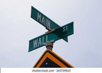 A Road Sign Is The Intersection Of Main Street And Wall Street, Central CA 