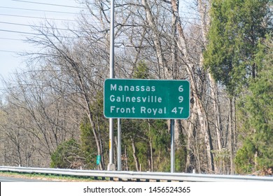 Road Sign To Manassas, Gainesville And Front Royal Along Interstate Highway 66 West In State Of Virginia