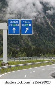Road sign near the Border between Italy and Austria with name of the City SALZBURG and VILLACH