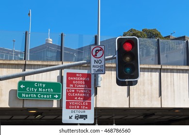 Road Sign : No Dangerous Goods In Tunnel, Low Tunnel Clearance Before Entering The Tunnel In Sydney, Australia
