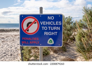 Road Sign On The Sea Beach No Vehicles To Turn Right Penalties Will Apply Australia