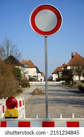 A road sign pole forbidding the prohibition on the street