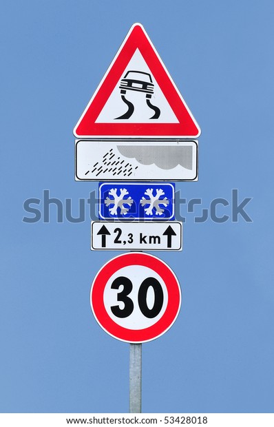 Road sign slippery dangerous\
road