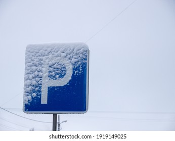 Road Sign In The Snow. Parking.