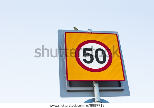 Road sign speed\
limit to 50, traffic sign.