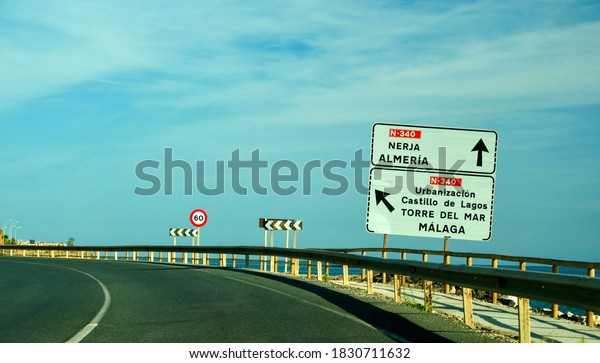 Road sign that\
shows directions to many places\

