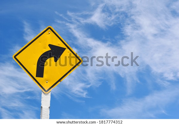 Road\
sign, traffic sign Curve road on blue sky for\
use