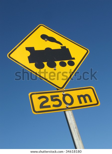 Road sign - train crossing\
 - 250 m